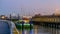 Lighted ship in the harbor of Blankenberge at sunset, Belgian architecture of a popular town in Belgium