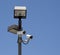 Lighted Surveillance Cameras On Pole