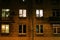 Lighted windows of a night apartment building