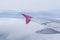 Lightening strikes Aircraft Wing of airplane on dark sky