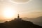 Lighthouse Armenistis in Mykonos at sunset