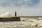 Lighthouse battered by huge waves on Portuguese Atlantic Ocean