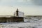 Lighthouse battered by huge waves on Portuguese Atlantic Ocean