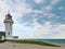 The lighthouse on the beach.