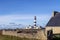 Lighthouse and Beacon of Ouessant, the island of Ushant, in Brittany, french rocky beach in northern France, Finistere