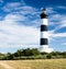 Lighthouse with blue sky and summer clouds in chassiron, Oleron Island, France