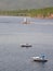 Lighthouse and boats in the Amur Bay, Sea of Japan. Vladivosto