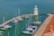 Lighthouse and boats near the island of San Giorgio Maggiore, in