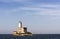 Lighthouse of Bocca island at Lido del Sole beach in Olbia harbor, Sardinia, Italy