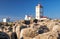 Lighthouse on Cabo Carvoeiro with rocks on foreground, Peniche