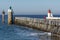 Lighthouse in the calm sea in Capbreton, France