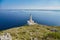 lighthouse of Cape of Otranto in Apulia standing on hard granite rocks is the most easterly point of Italy, marks the meeting of
