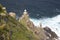 Lighthouse at Cape Point with stormy sea