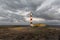 Lighthouse, cloudy sky, evening