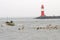 Lighthouse at the coastline, warnemuende, rostock, germany