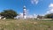 Lighthouse at Countryside rural clouds Timelapse. Tropical scenery.