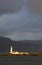 Lighthouse and dark clouds