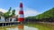 Lighthouse in the daytime on side river