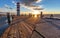 Lighthouse, dramatic sunset during winter