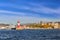 Lighthouse on edge of breakwater in Sochi sea port