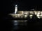 The lighthouse of el morro fort night in cuba