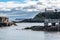 Lighthouse at the entrance to the port of the picturesque and tourist village of Cudillero, Asturias.