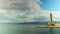 Lighthouse and the entrance to the port, time-lapse