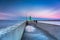 The lighthouse at the exit to the Baltic Sea in New Port at dusk, Gdansk. Poland