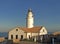 Lighthouse far de capdepera, daytime, sunny blue sky with seagull, cala ratjada, mallorca, spain