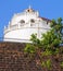 The lighthouse and fortress walls of Fort Aguada, Goa