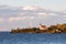 Lighthouse and Gathering Clouds in Evening Light