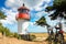 Lighthouse Gellen and bicycles. Sunny summer day. Hiddensee, Baltic Sea.