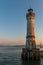 The lighthouse at the harbor entrance of the island Lindau at the Lake Constance in Bavaria, Germany