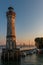 The lighthouse at the harbor entrance of the island Lindau at the Lake Constance in Bavaria, Germany