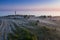 Lighthouse and hause on the small island in the Baltic Sea. Architecture on the Osmussaar