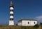 Lighthouse and hause on the small island in the Baltic Sea. Architecture in Osmussaar