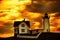 The lighthouse and the house of the keeper of the lighthouse on the hill against the sunset sky. Atlantic Ocean. USA. Maine.  Nubb