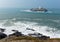 Lighthouse and island Cornwall coast England UK