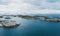 Lighthouse and island ocean aerial view in Norway Lofoten islands drone landscape