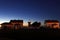 Lighthouse and its surroundings Silhouette at the warm magical afterglow in summer