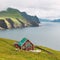 Lighthouse keeper`s house on the Mykines island