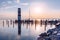 Lighthouse at Lake Neusiedl, Podersdorf am See, Burgenland, Austria. Lighthouse at sunset in Austria. Wooden pier with lighthouse