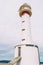 Lighthouse on the lonely beach of delta del ebro, tarragona, spain