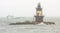 Lighthouse in Long Island Sound with Ferry