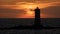 the lighthouse of the Mangiabarche on a serene sunset,autumn day