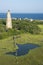 Lighthouse in marsh.