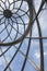 Lighthouse metallic and glass dome structure detail and blue sky