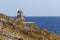 Lighthouse near the city Monemvasia against the background of the sea and sky Greece, Peloponnese