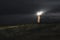 Lighthouse at night on Sylt island, at North sea,  on dunes