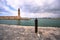 Lighthouse in the old port at evening in the city of Rethymnon